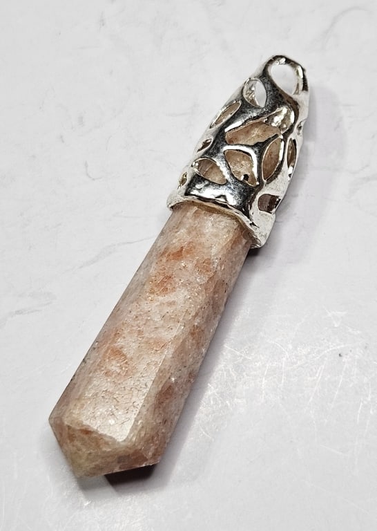 Sunstone Pendant Point w/ Silver Plate Wrap: Item is the exact item in image - Bidder is responsible for all value and grade determination - Please review all terms prior to placing any bids- Any bid is an agreement to all terms and