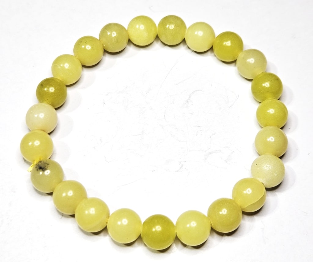 6mm Yellow Quartz Stretchy Bracelet: Item is the exact item in image - Bidder is responsible for all value and grade determination - Please review all terms prior to placing any bids- Any bid is an agreement to all terms and