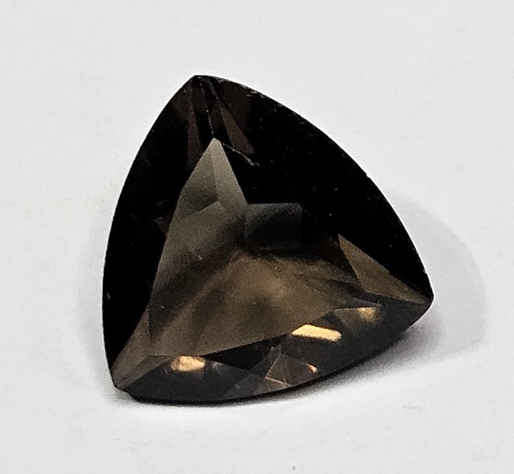 1.95 ct. Natural Trilliant Cut Smoky Quartz Gem: Items are as described in the tile - Please use the image to verify the item - Please review the entire terms and conditions prior to placing any bids- All sales final -