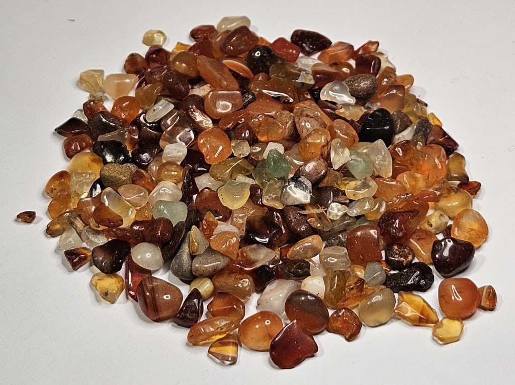 278.65 tcw. Natural Carnelian Tumbled Chips: Items are as described in the tile - Please use the image to verify the item - Please review the entire terms and conditions prior to placing any bids- All sales final -