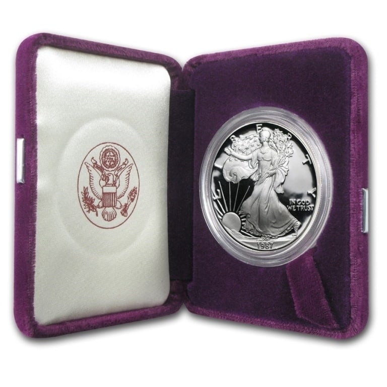 1987 US Mint Silver Eagle proof in OMP: Item is as shown in the image - Due to the fact that we have more than one of these items - Winning bidder may not receive the exact item(s) in the image - Item recieved will have all withoriginalmint