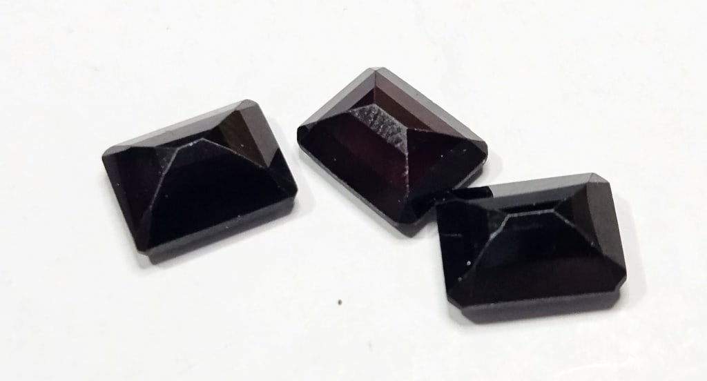 8.65 tcw. Natural Rectangle Cut Garnets - 2
