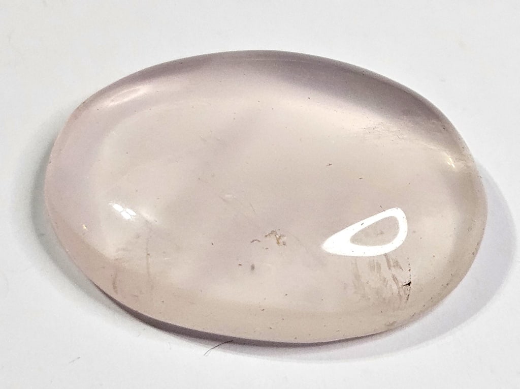 33.9 cts. Natural Rose Quartz Cabachon: Items are the exact items in the image - Please review the entire terms and conditions prior to placing any bids- Bidder is responsible for all value and grade determination-