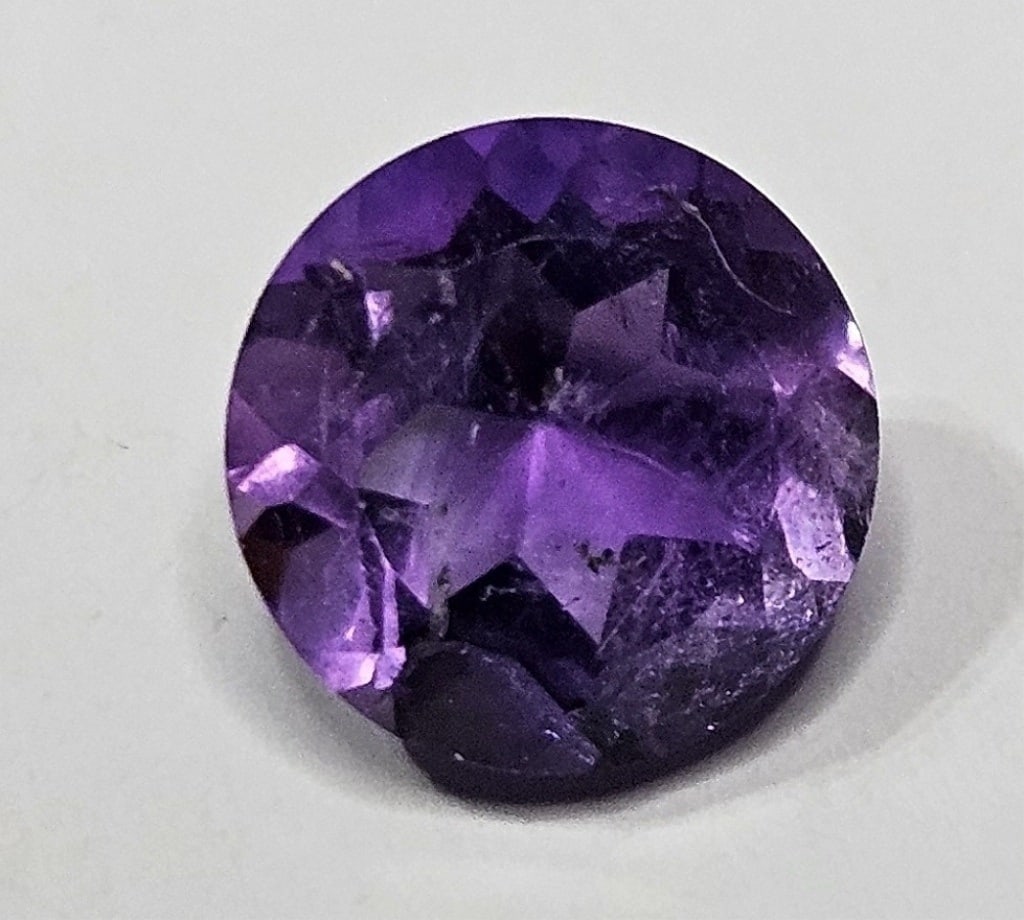 1.80 ct. Round Brilliant Amethyst Gemstone: Item is the exact item in the image- Bidder is responsible for all value and grade determination -