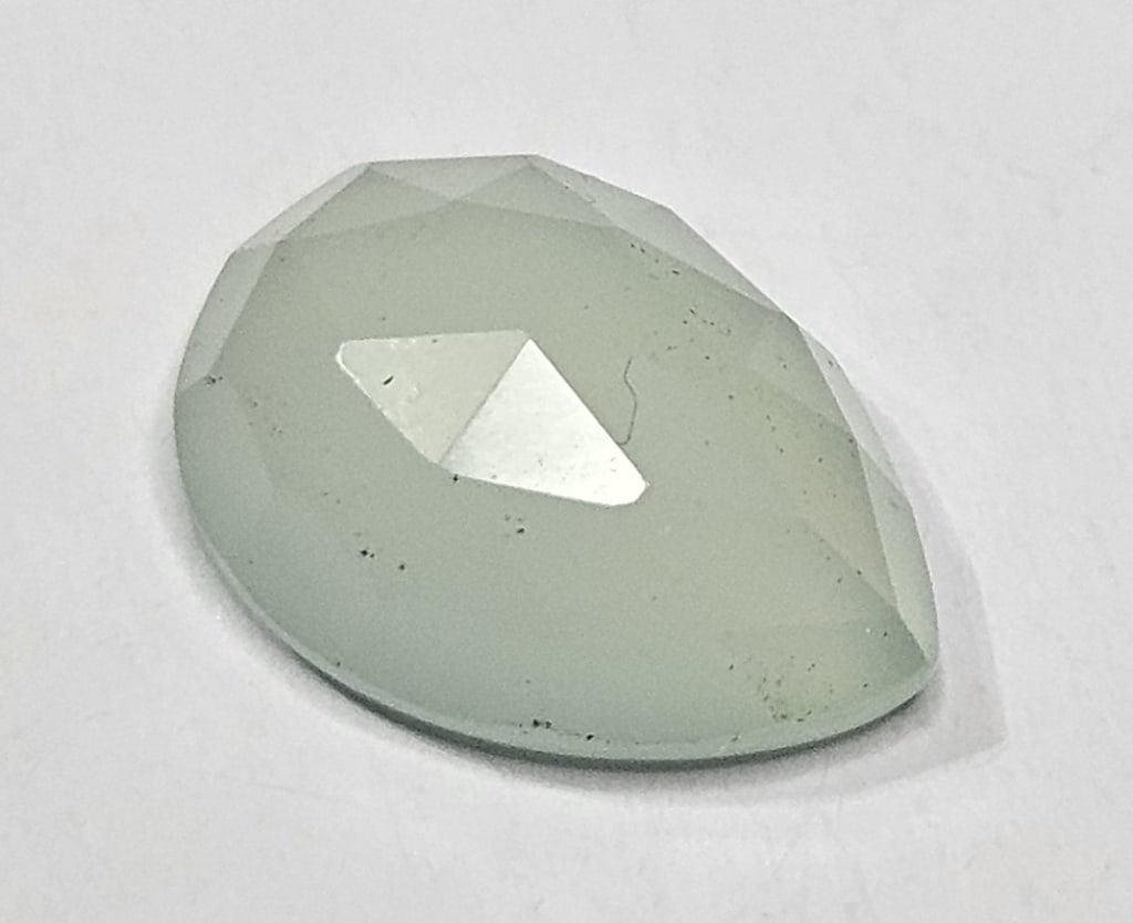 5 ct. Natural Chalcedony Pear Gemstone: Item is the exact item in the image- Bidder is responsible for all value and grade determination -