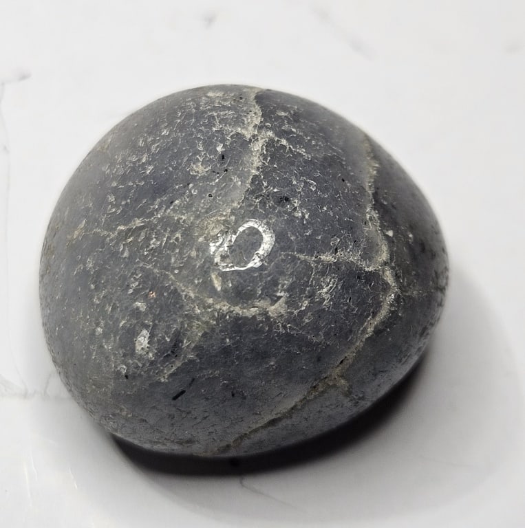 18.91 gram Natural Tumbled Iolite Stone: Item is the exact item in the image - Bidder is responsible for all value and grade determination