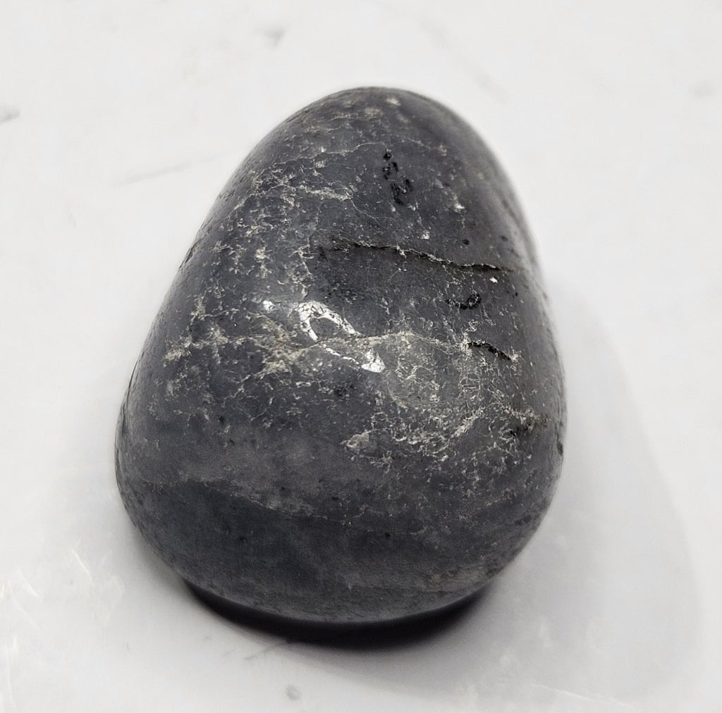 16.68 gram Natural Iolite Tumbled Stone: Item is the exact item in the image - Bidder is responsible for all value and grade determination