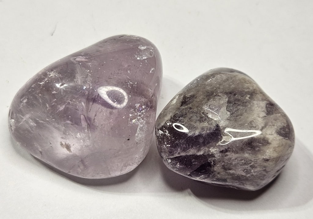 66.64 gram Natural Amethyst Tumble Stones: Item is the item in the image - Bidder is responsible for all value and grade determination - Please review all terms and conditions prior to placing any bids- All bids are an agreementtoallterms-