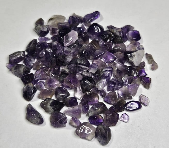 28.91 gram Natural Amethyst Chip Tumbles: Item is the item in the image - Bidder is responsible for all value and grade determination - Please review all terms and conditions prior to placing any bids- All 