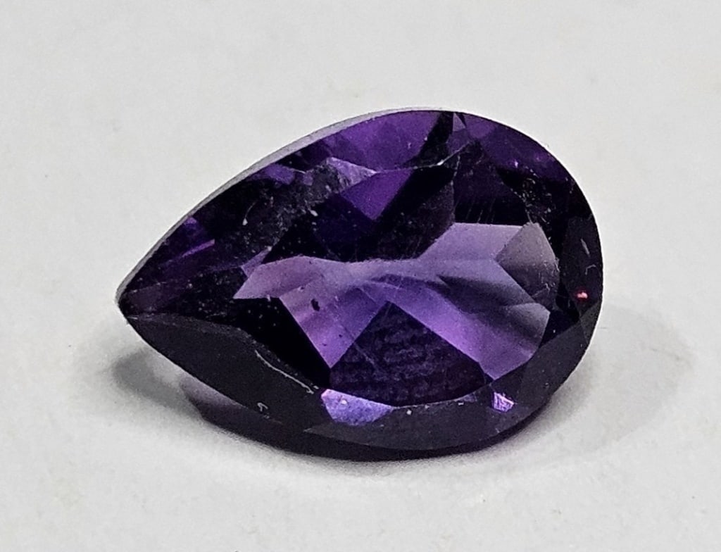 2.05 ct. Natural Amethyst Gemstone: Item is the exact item in the image- Bidder is responsible for all value and grade determination -