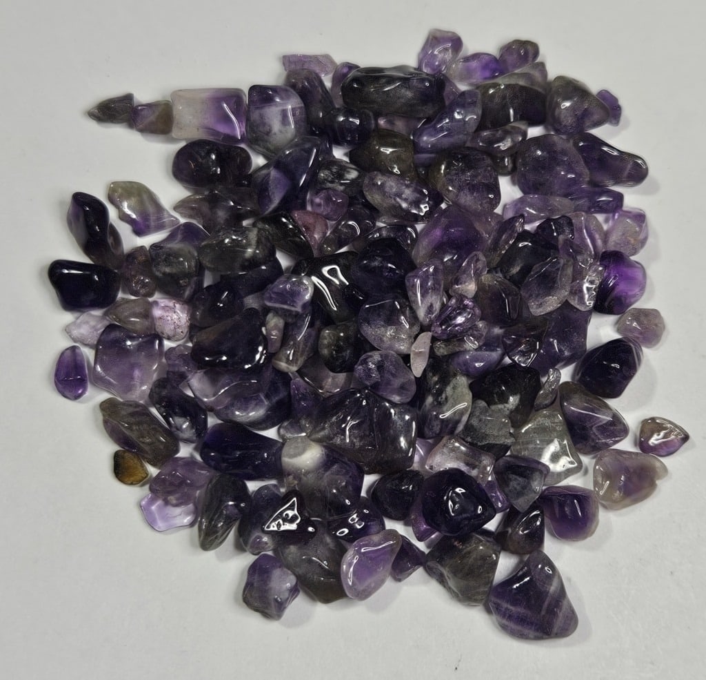 31.33 gram Natural Amethyst Tumbled Chips: Item is the item in the image - Bidder is responsible for all value and grade determination - Please review all terms and conditions prior to placing any bids- All bids are an agreementtoallterms-