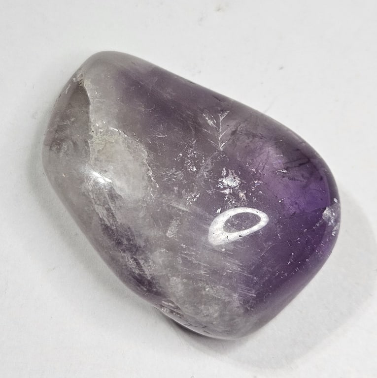 36.72 gram Natural Amethyst Tumble Stone: Item is the item in the image - Bidder is responsible for all value and grade determination - Please review all terms and conditions prior to placing any bids- All bids are an agreementtoallterms-
