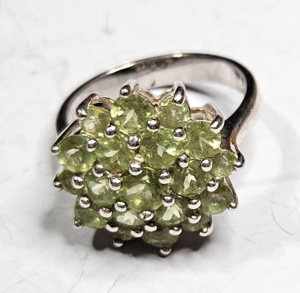 Sterling Silver Ring w/ Peridot Gemstones: Item is the exact item in the image- Bidder is responsible for all value and grade dtermination - Please review all terms and conditions prior to placing any bids-