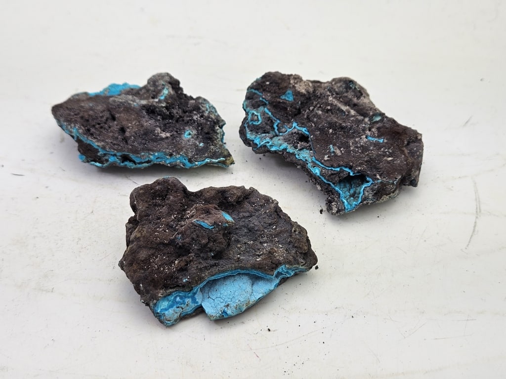 102.8 gram Natural Chrysocolla Specimen Parcel: Item is the exact item in the image- Bidder is responsible for all value and grade dtermination - Please review all terms and conditions prior to placing any bids-