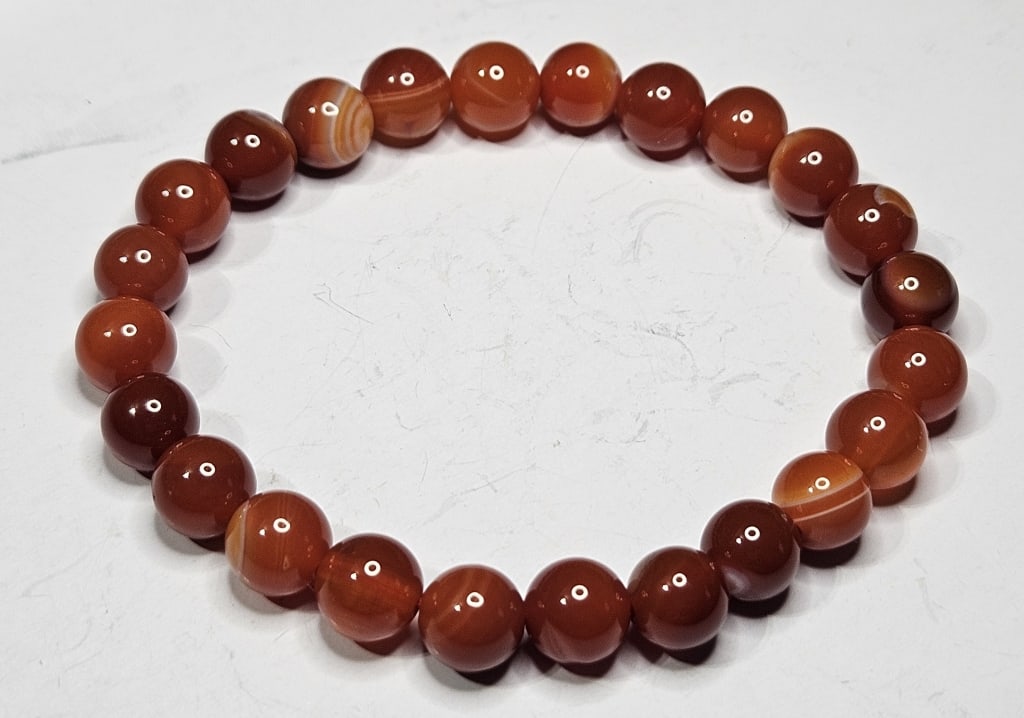 8mm Red Sardonny Stretchy Bracelet: Item is the exact item in image - Bidder is responsible for all value and grade determination - Please review all terms prior to placing any bids- Any bid is an agreement to all terms and