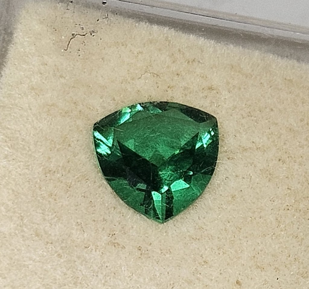 9mm Trilliant Cut Mt. St. Helens Obsidianite Gem: Item is the exact item in image - Bidder is responsible for all value and grade determination - Please review all terms prior to placing any bids- Any bid is an agreement to all terms and