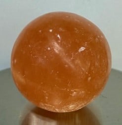 Orange Selenite Round Ball: STAND NOT INCLUDED - Item is the exact item in the image - Bidder is responsible for all value and grade determination - Please review all terms and conditions prior to placing any bids- All
