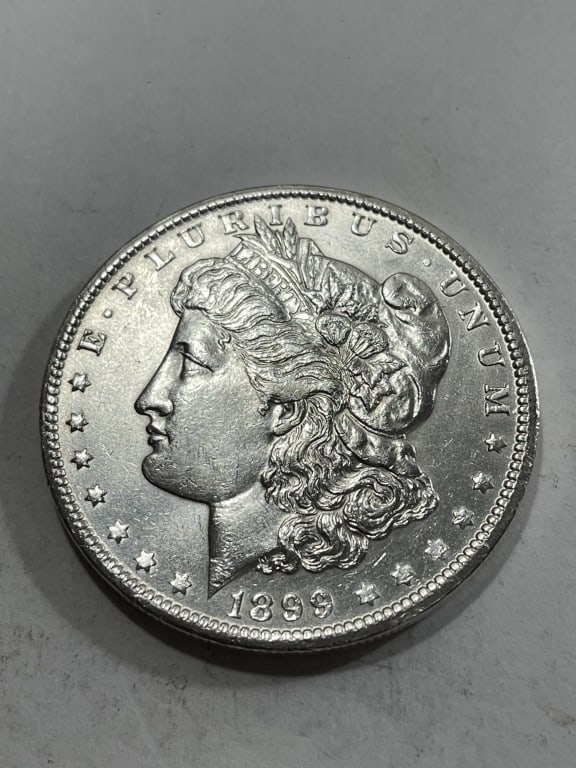 1899 o Better Date Morgan Silver Dollar BU Grade: Item is the item in the image. Bidder must determine grade and value by your bid amount. Please refer to all the terms set forth in this auction.
