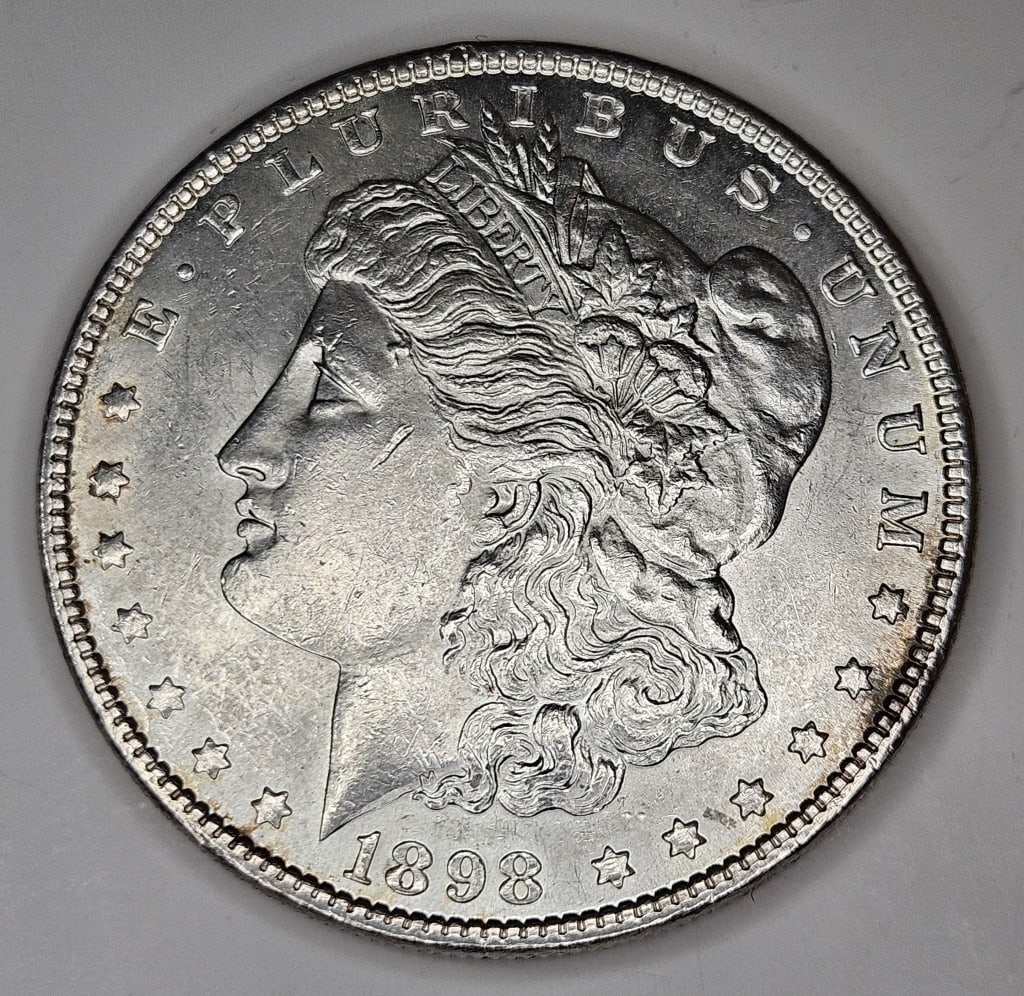 1898 P BU Grade Morgan Silver Dollar: Item is the exact item in the image - Bidder is responsible for all value and grade determination - Please review the images and complete terms prior to placing any bids.