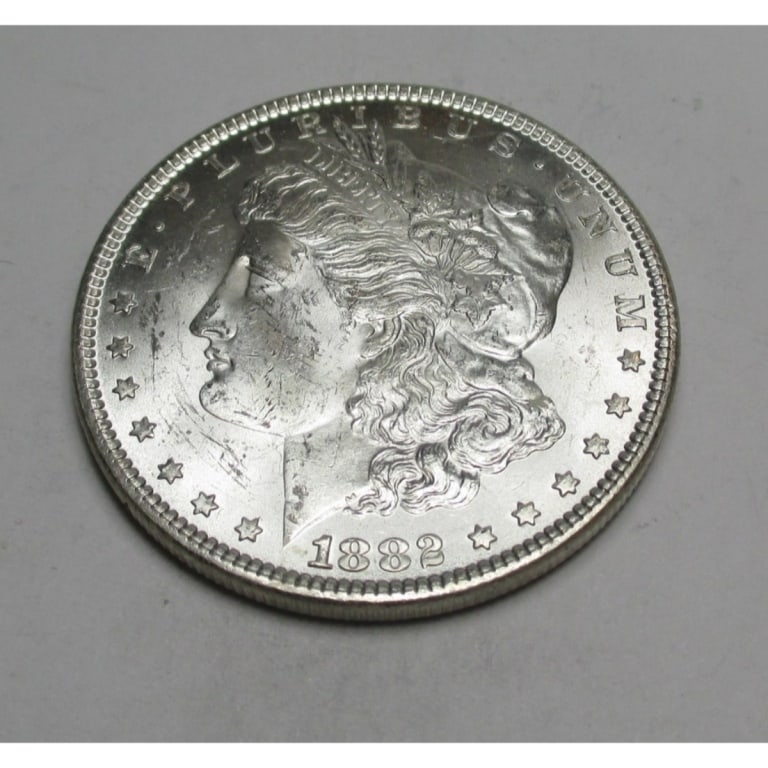1882 P BU Grade Morgan Dollar: Type will be our choice and from on hand at time of sale. Item is the EXACT ITEM in the image. Bidder is responsible for all value and determination of value. The images are high resolution andtheEXAC