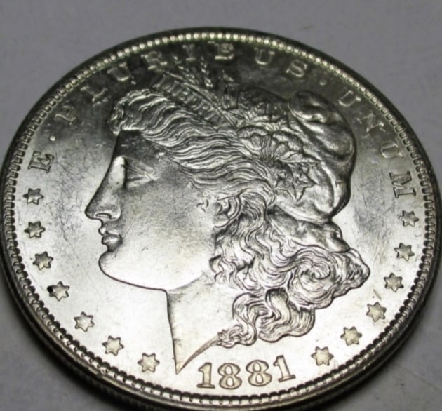 1881 s BU Grade Morgan Silver Dollar: Type will be our choice and from on hand at time of sale. Item is the EXACT ITEM in the image. Bidder is responsible for all value and determination of value. The images are high 