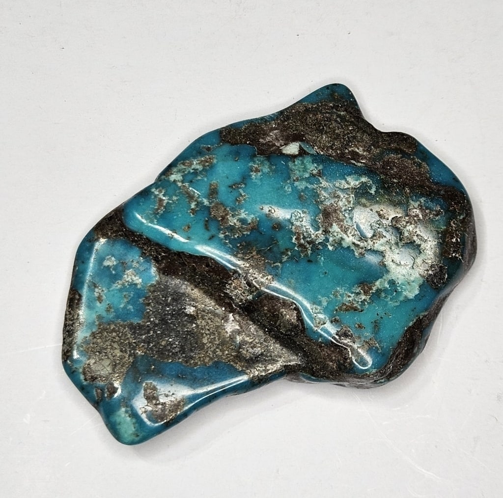57.95 ct. Natural Freeform Turquoise Nugget: Item is the exact item in the image- Bidder is responsible for all value and grade determination- Please review all terms and conditions prior to placing any bids - All bids are an agreement to pay fo
