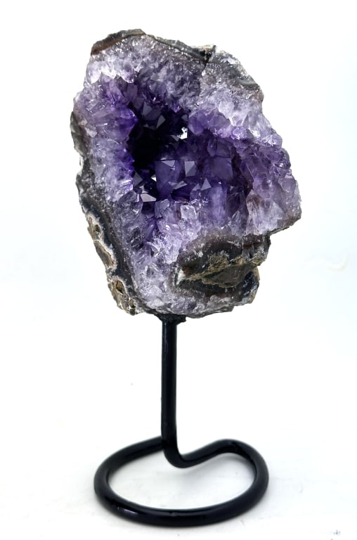 Exceptional Amethyst Cluster on Stand: Amethyst is a violet variety of quartz. Ancient Greeks wore amethyst and carved drinking vessels from it in the belief that it would prevent intoxication. Amethyst, a semiprecious stone, is often used