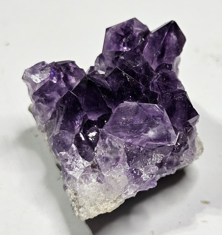 22.61 gram Gem Grade Natural Amethyst Cluster: Item is the exact item in the image - Bidder is responsible for all value grade determination - Please review all terms and conditins prior to placing any bids- All sales are final and all