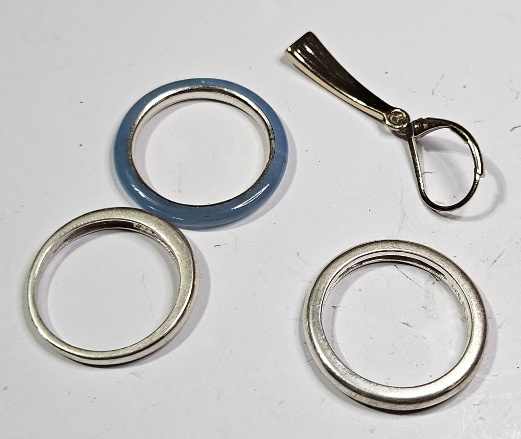 10.72 grams Sterling Silver Items: Item is the exact item in the image - Bidder is responsible for all value grade determination - Please review all terms and conditions prior to placing any bids- All sales are final and all