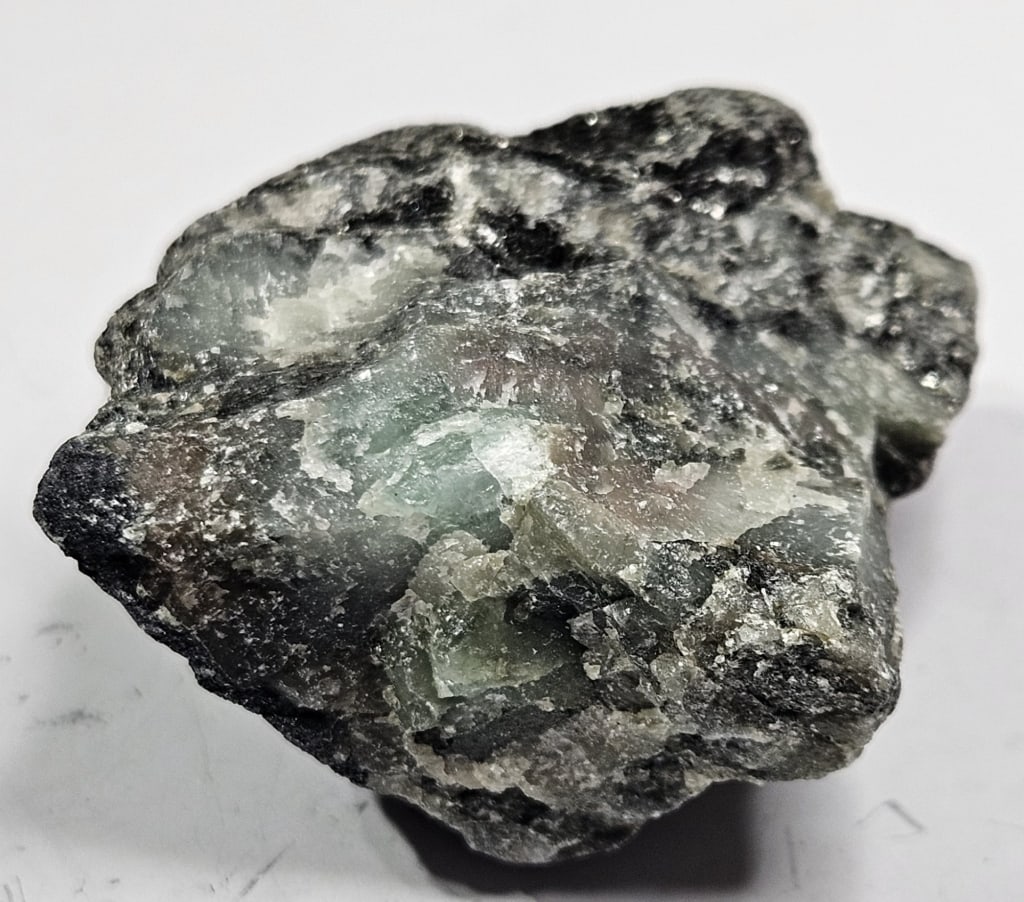 28.17 gram Natural Rough Emerald Specimen: Item is the exact item in the image - Bidder is responsible for all value grade determination - Please review all terms and conditions prior to placing any bids- All sales are final and all