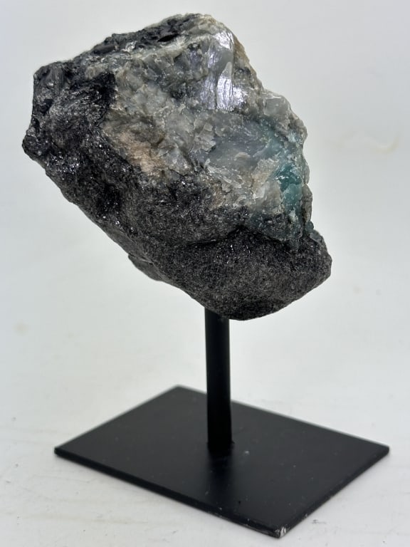 Natural Rough Emerald Specimen on Stand: Item is the exact item in the image - Bidder is responsible for all value and grade determination. Please review all terms and conditions prior to placing any bids-