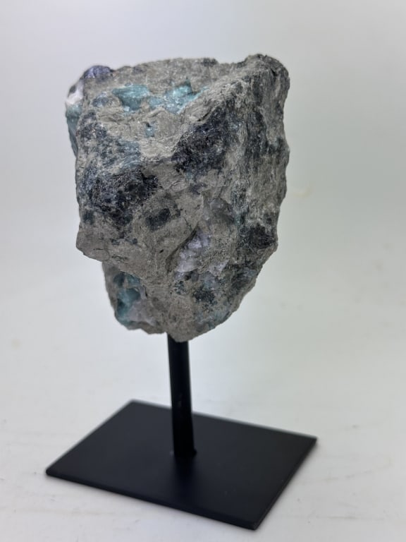 Natural Rough Emerald Specimen on Stand: Item is the exact item in the image - Bidder is responsible for all value and grade determination. Please review all terms and conditions prior to placing any bids-