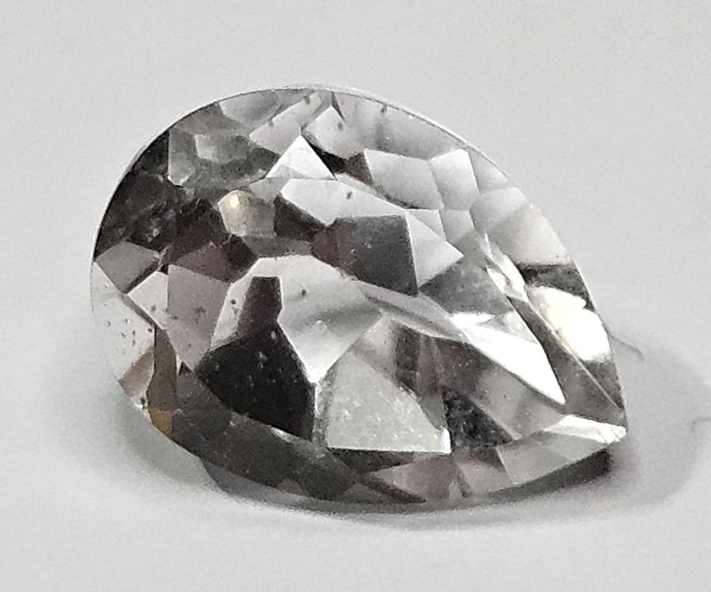 5.85 ct. Natural White Topaz Pear Shape Gemstone: Items are as described in the tile - Please use the image to verify the item - Please review the entire terms and conditions prior to placing any bids- All sales final -
