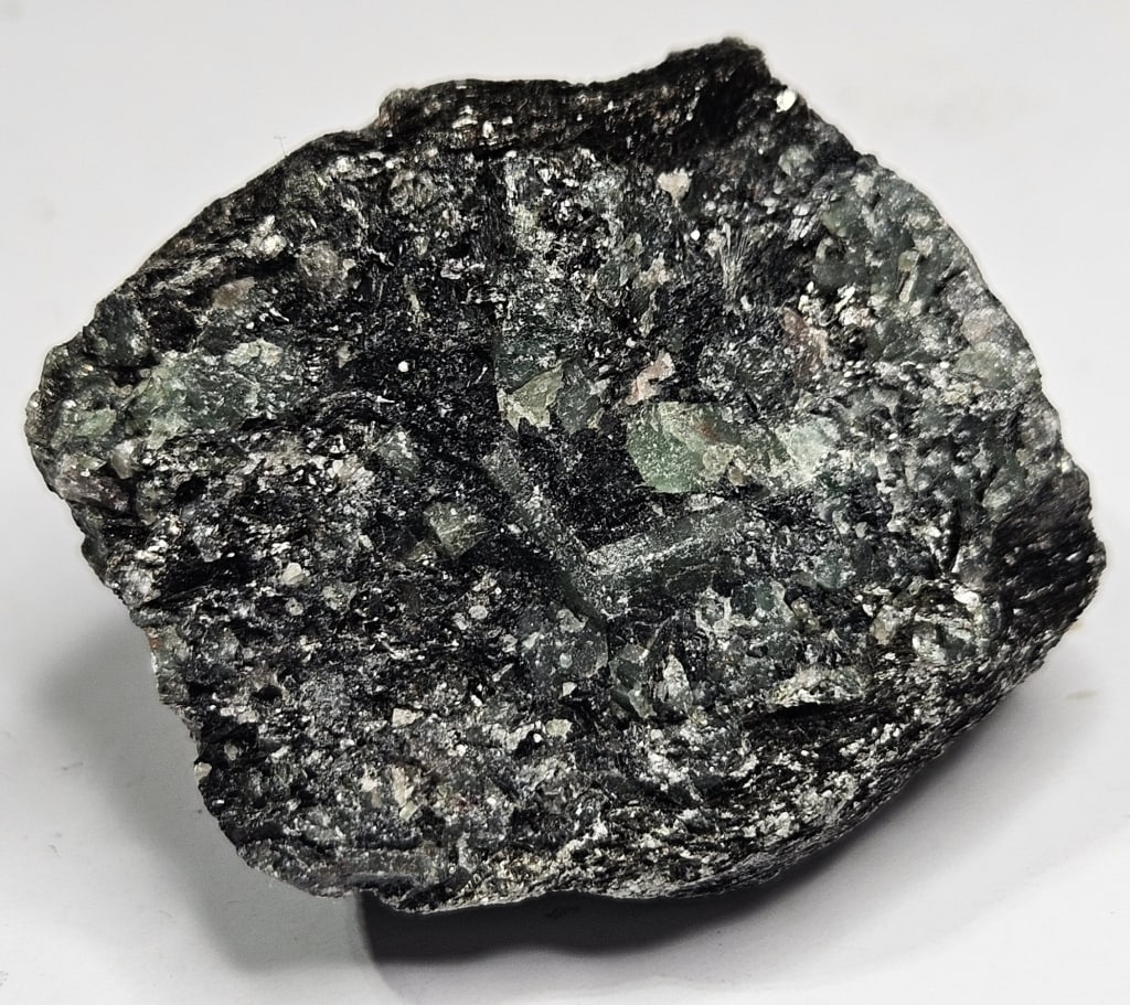 32.23 gram Natural Rough Emerald Specimen: Item is the exact item in the image - Bidder is responsible for all value grade determination - Please review all terms and conditins prior to placing any bids- All sales are final and all invoices du