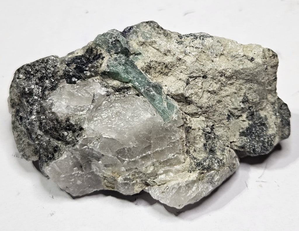 22.67 gram Natural Rough Emerald Specimen: Item is the exact item in the image - Bidder is responsible for all value grade determination - Please review all terms and conditions prior to placing any bids- All sales are final and all invoices d