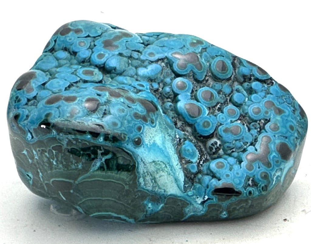 285.70 gram Natural Chrysocolla/Malachite Specimen: Chrysocolla has a cyan (blue-green) color and is a minor ore of copper, having a hardness of 2.5 to 7.0. It is of secondary origin and forms in the oxidation zones of copper ore bodies. Associated min