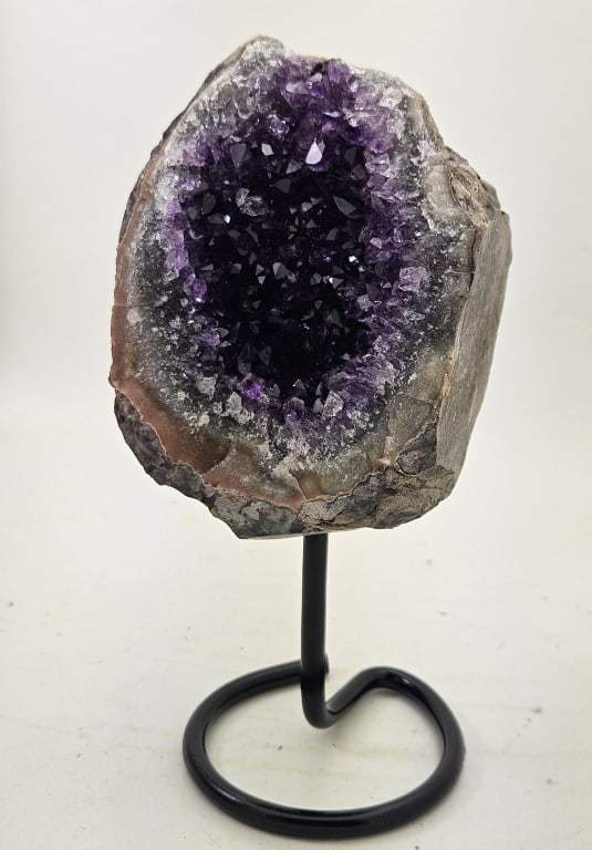 Fine Uruguay Amethyst Geode Cluster on Stand: Alacam Amethyst is a rare, vibrant purple to lavender amethyst discovered in 2021 in the Balikesir Province of Turkey. Known for its unique, sculptural, and often self-standing formations, this materi