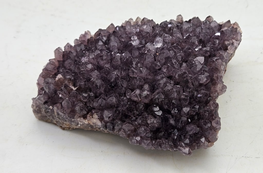 238.49 gram Natural Alacam Amethyst Cluster: Alacam Amethyst is a rare, vibrant purple to lavender amethyst discovered in 2021 in the Balikesir Province of Turkey. Known for its unique, sculptural, and often self-standing formations, this