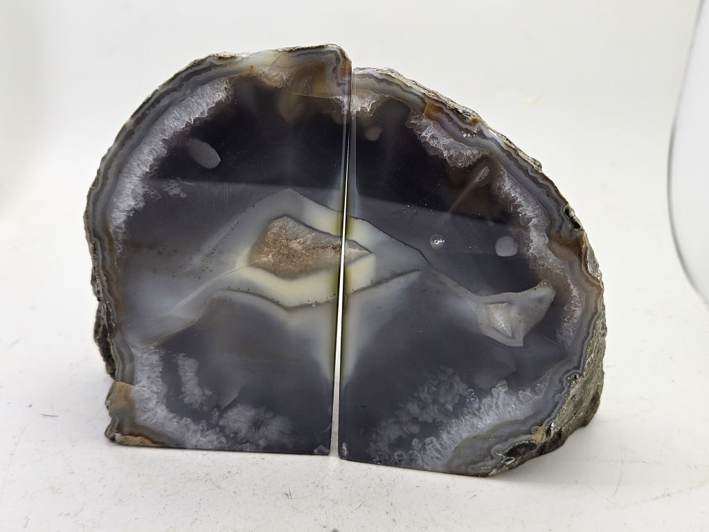 Banded Agate w/ Geode Pockets Book Ends: Item is the exact item in the image- Bidder is responsible for all value and grade determination- Please review all terms and conditions prior to placing any bids-