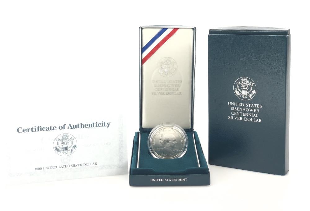 1990 Ike Commemorative Silver Dollar in OMP: Items are as shown in the image and described in the title - Please note tht we have more than one of these items and the exact item in the image may not be the item you recieve. Winning bidder will r