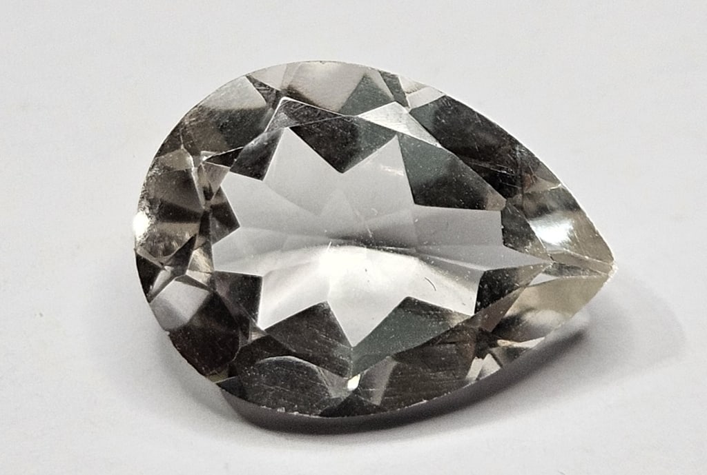 7.30 ct. Natural Pear Shape White Topaz Gemstone: Item is the exact item in the image- Bidder is responsible for all value and grade determination- Please review all terms and conditions prior to placing any bids - All bids are an agreement to pay fo