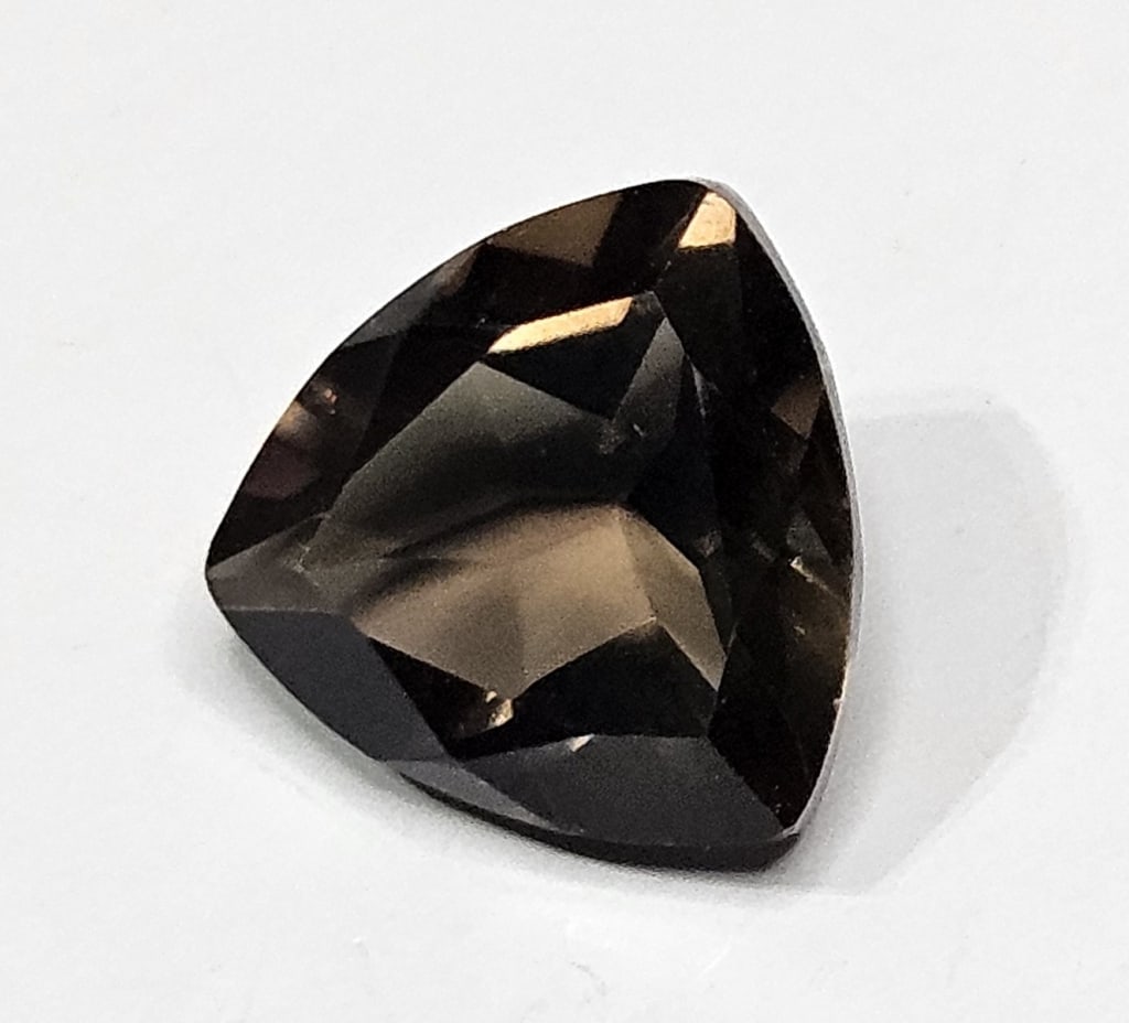 4.35 ct. Natural Trilliant Cut Smoky Quartz Gem: Items are as described in the tile - Please use the image to verify the item - Please review the entire terms and conditions prior to placing any bids- All sales final -