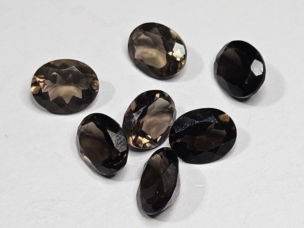 16.40 tcw. Natural Smoky Qurtz Gem Parcel: Items are as described in the tile - Please use the image to verify the item - Please review the entire terms and conditions prior to placing any bids- All sales final -