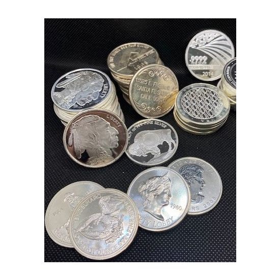 A SINGLE 1 oz Silver Round Random Design: A 1 oz Random Design and maker silver round - Item will be from our stock on hand at the time of the sale. no guarantee as to the type or design.