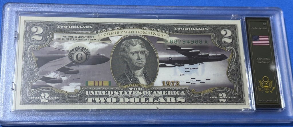 $2 - Christmas Bombing - Vietnam Bradford Case: Item is the exact item in the image- Bidder is responsible for all value and grade determination - Please review the entire terms and conditions prior to placing any bids-