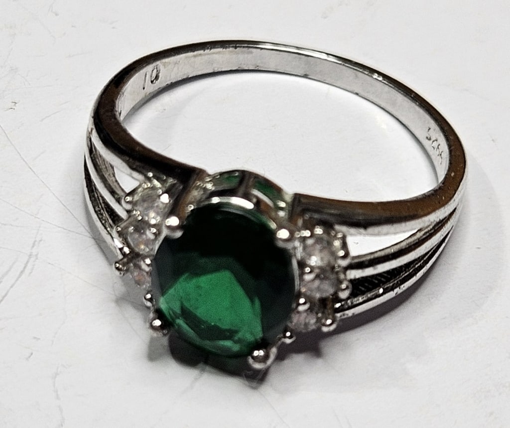 Sterling Silver Man Made Emerald Ring: Item is the exact item in the image- Bidder is responsible for all value and grade dtermination - Please review all terms and conditions prior to placing any bids-
