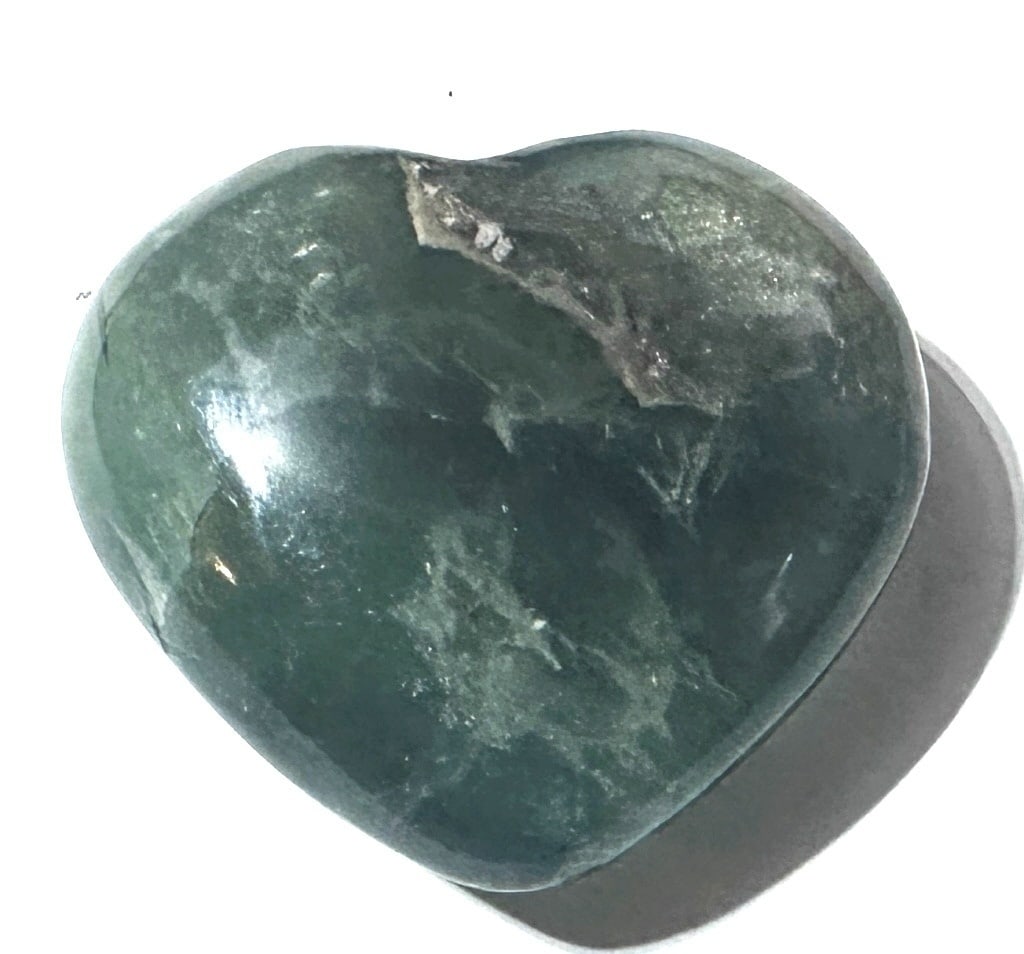 57.05 Gram Flourite Heart Shape Palm Stone: Item is the exact item in image - Bidder is responsible for all value and grade dtermination - Please review all terms and conditions