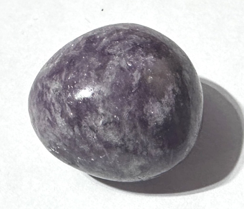 16.32 gram Lepidolite Tumbled Stone: Item is the exact item in image - Bidder is responsible for all value and grade dtermination - Please review all terms and conditions