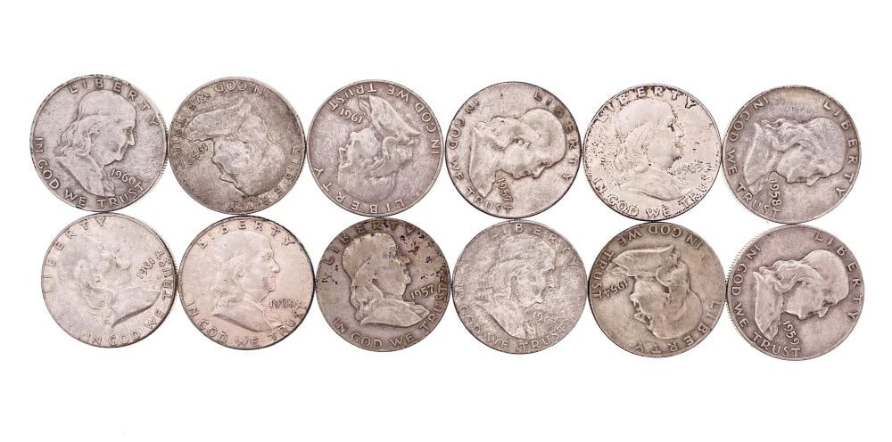 (12) Random Date/Grade Franklin Half Dollars: Items are as shown in the image and described in the title - Please note that we have more than one of these items and the exact item in the image may not be the item you recieve. Winning bidder will