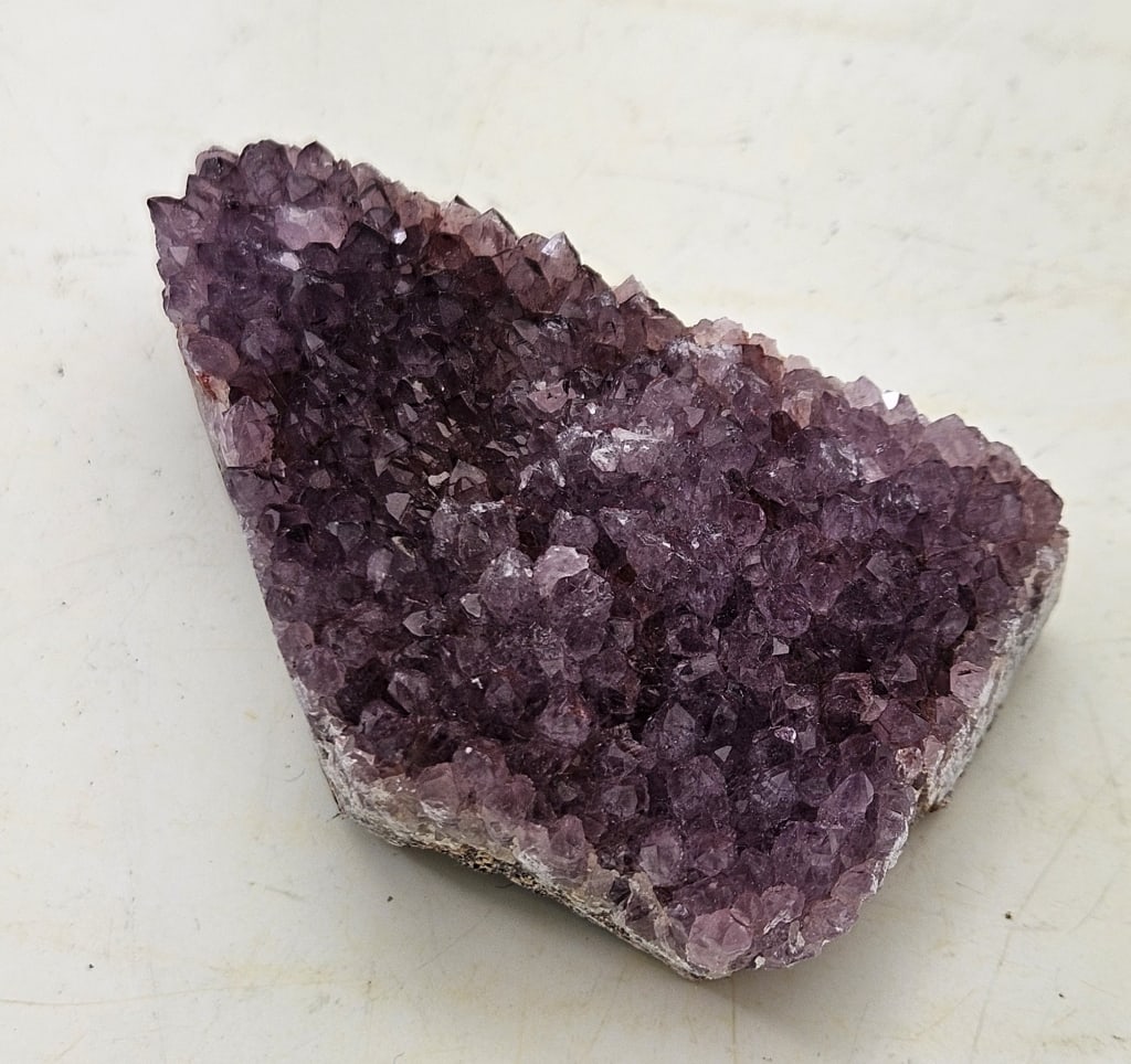 67.04 gram Natural Alacam Amethyst Cluster: Alacam Amethyst is a rare, vibrant purple to lavender amethyst discovered in 2021 in the Balikesir Province of Turkey. Known for its unique, sculptural, and often self-standing formations, this